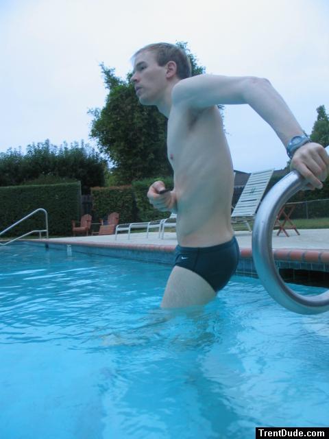 Green Nike speedo (stretching!)