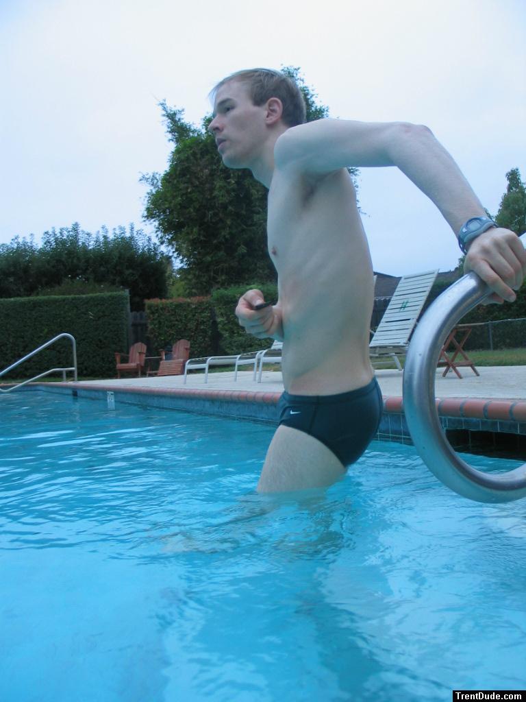 Green Nike speedo (stretching!)
