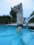 Green Nike speedo (stretching!)