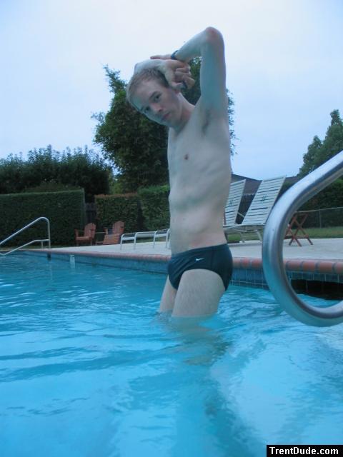 Green Nike speedo (stretching!)