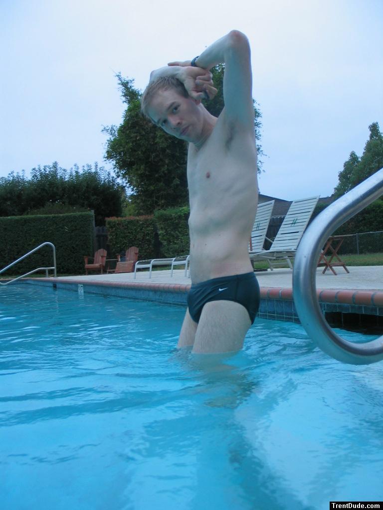 Green Nike speedo (stretching!)