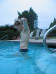 Green Nike speedo (stretching!)