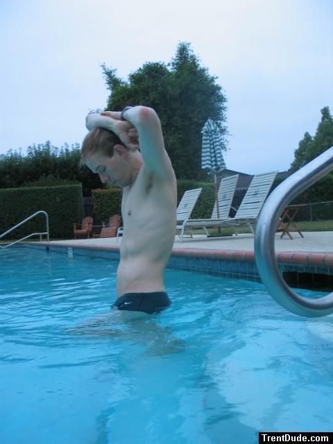 Green Nike speedo (stretching!)