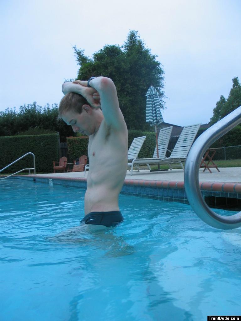 Green Nike speedo (stretching!)