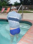 swimmer wearing a Nike swim brief (rear)
