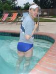 swimmer wearing a Nike swim brief (rear)