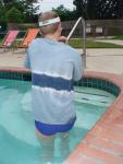 swimmer wearing a Nike swim brief (rear)