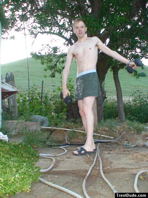 Lifting weights in his boxers