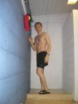 Speedo jammers and Nike slippers