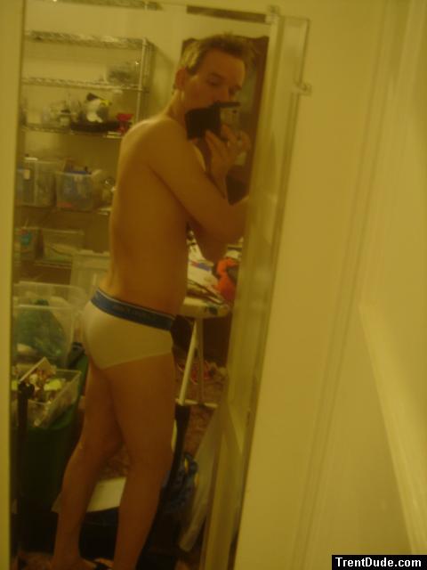 Calvin Klein Underwear in a messy room