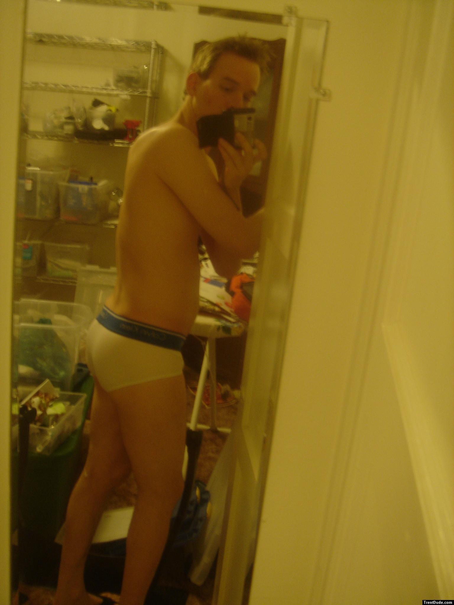 Calvin Klein Underwear in a messy room