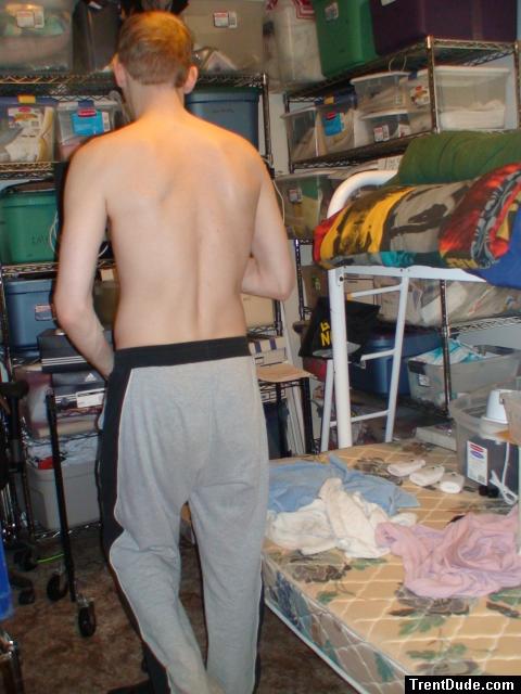 Grey sweats, short hair