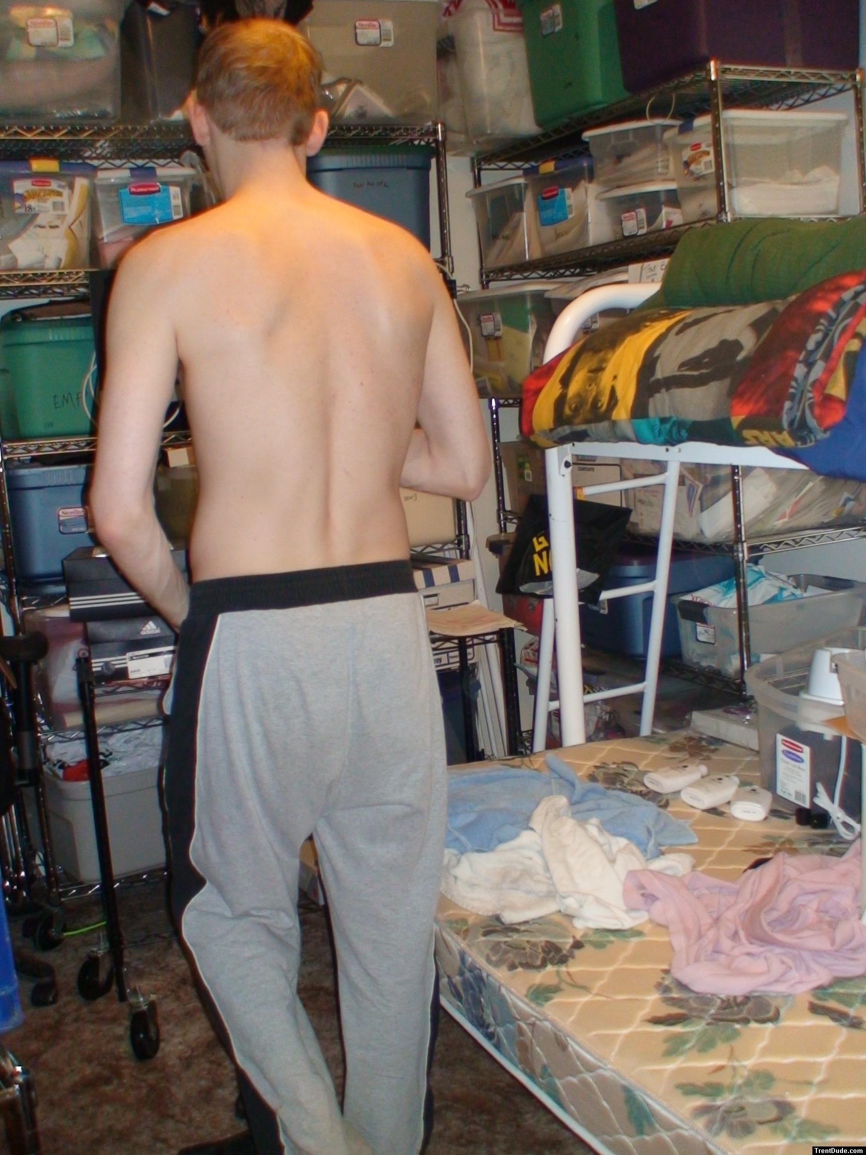 Grey sweats, short hair