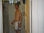 Shirtless in white addidas shorts