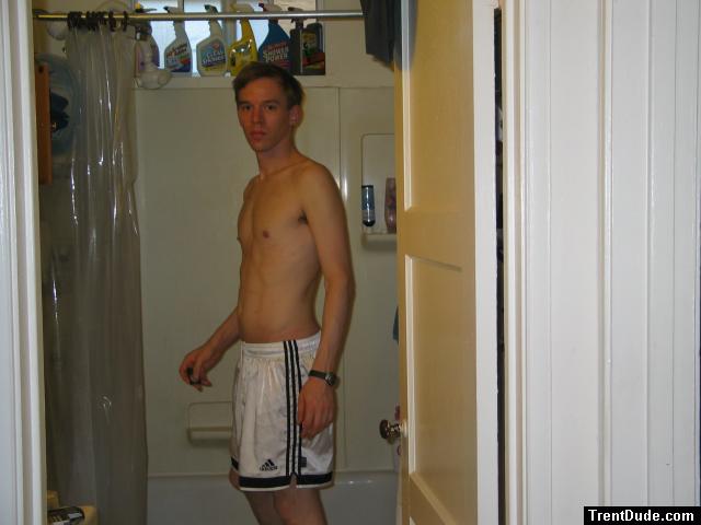 Shirtless in white addidas shorts