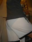 ``White addidas shorts, wet blue hanes underneath