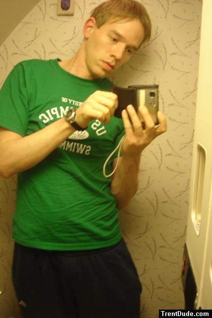 getting undressed in an airplane bathroom