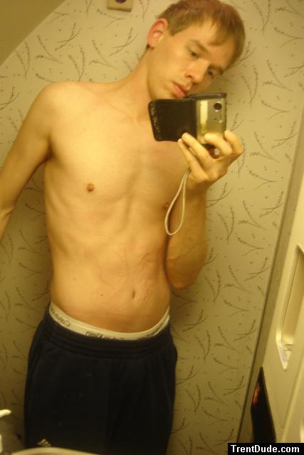 Blue sweat pants and calvin Klein breifs on the airplane