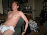 dude lounging in Calvin Klein briefs in a chair (best!)
