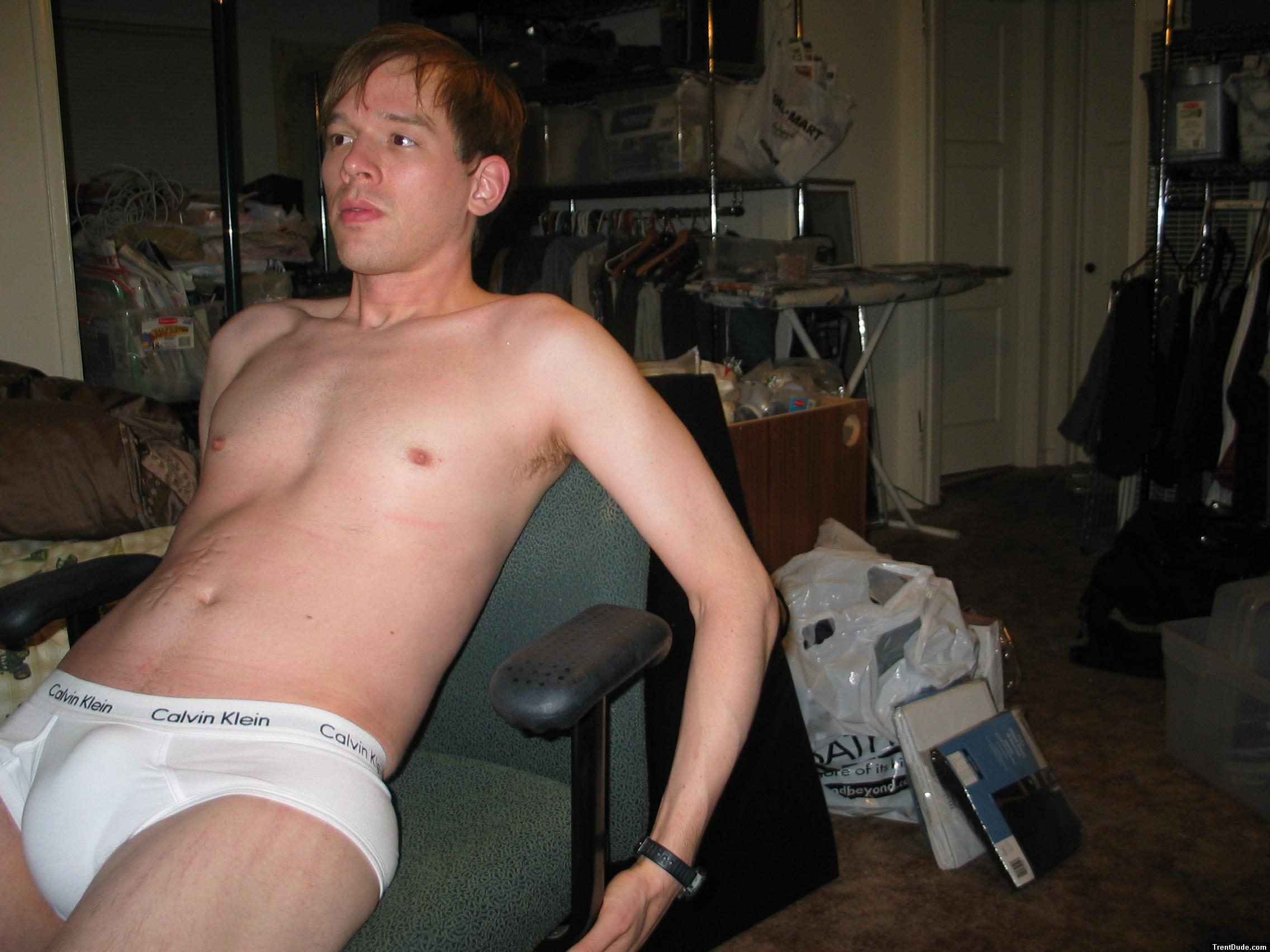 dude lounging in Calvin Klein briefs in a chair (best!)