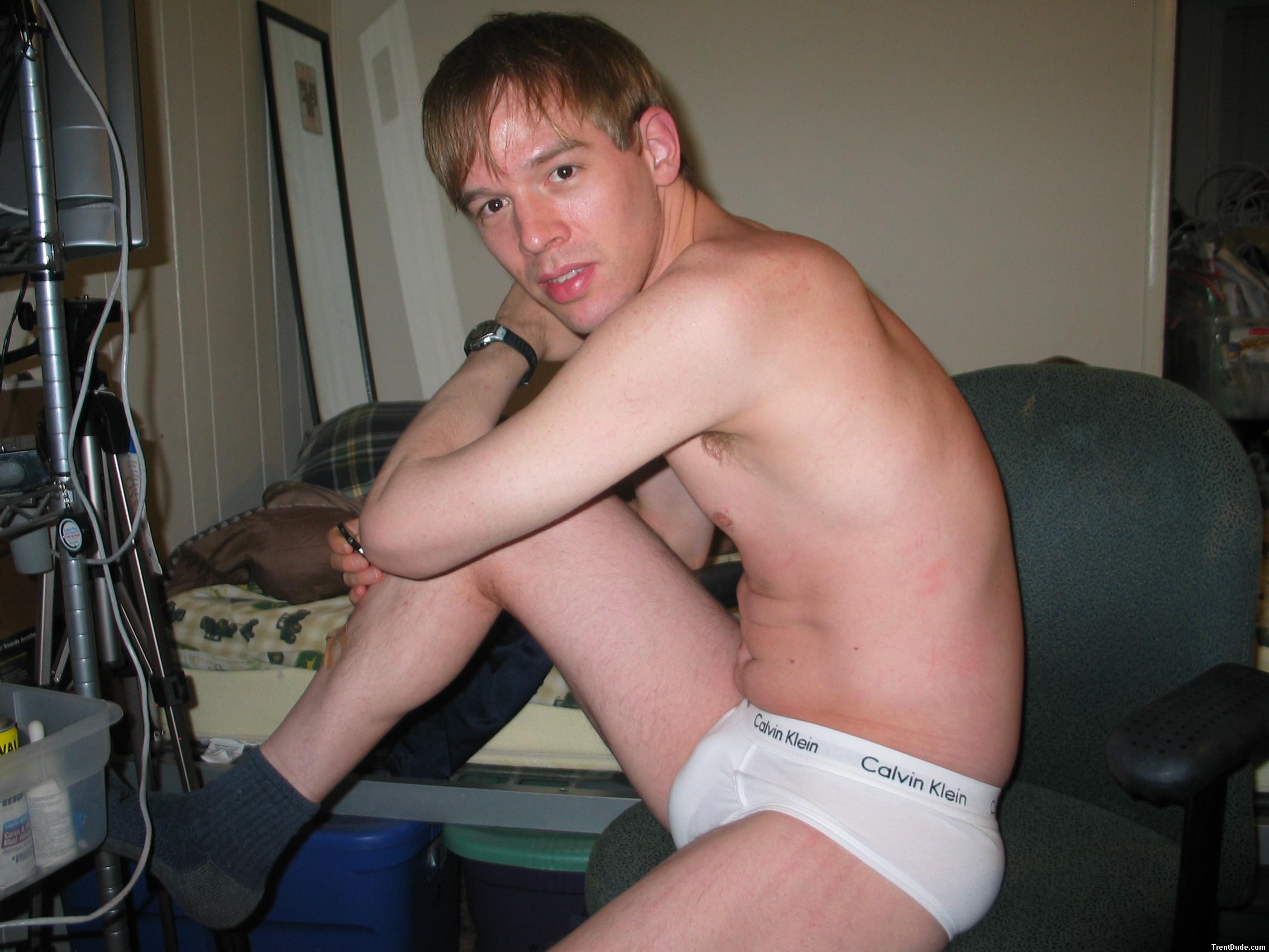 Stretching his legs in Calvin Klein white briefs