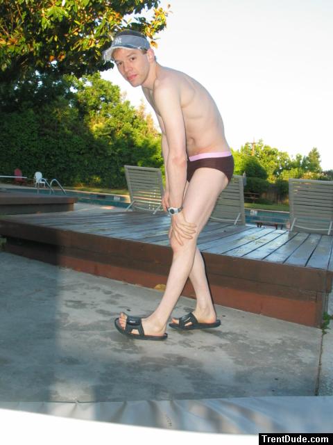 Stretching his calf muscles