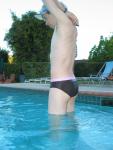 swimmer doing some stretches (armpit, round butt)