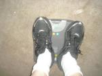 Trent's feet while weighing himself on a scale