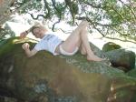 Laying on a rock