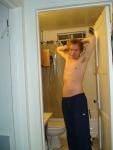 Showing his armpits in addidas Sweat pants