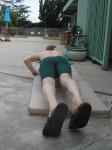 leg and bone anatomy (wearing a Nike green swim jammer)