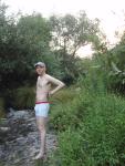 Wearing Calvin Klein boxer briefs in a stream