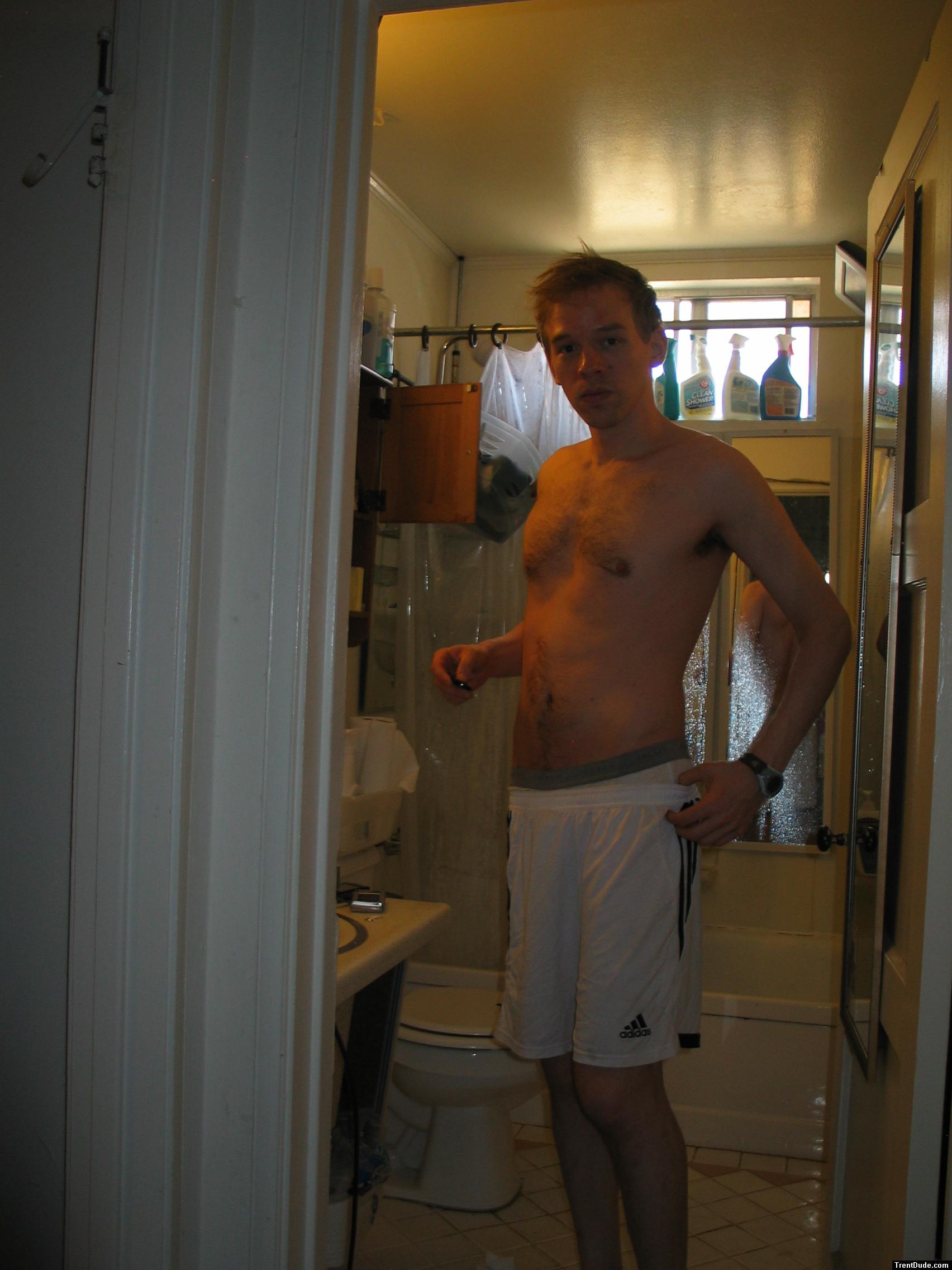 White Addiadas shorts over Jockey briefs