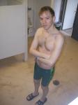 Green Nike swim jammer, chest hair, NIke slippers