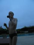 Green Nike speedo brief in the pool