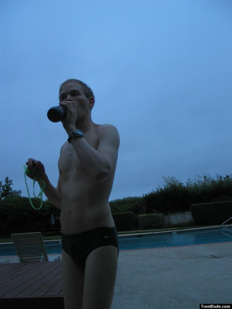 Green Nike speedo brief in the pool
