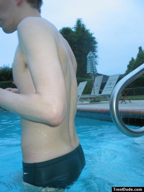 Green Nike speedo brief in the pool (back)