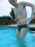 Green Nike speedo brief in the pool
