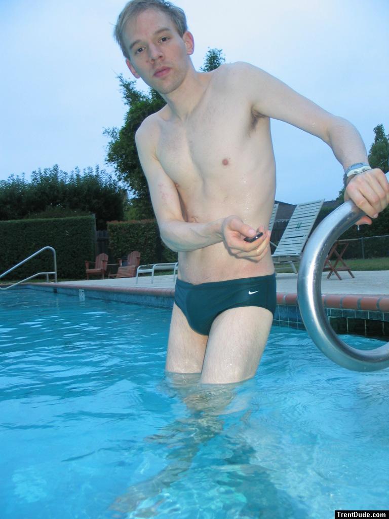 Green Nike speedo brief in the pool