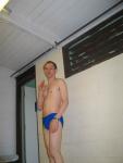 Wearing a blue Nike speedo brief