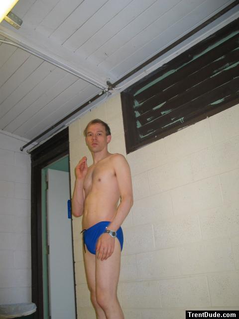 Wearing a blue Nike speedo brief