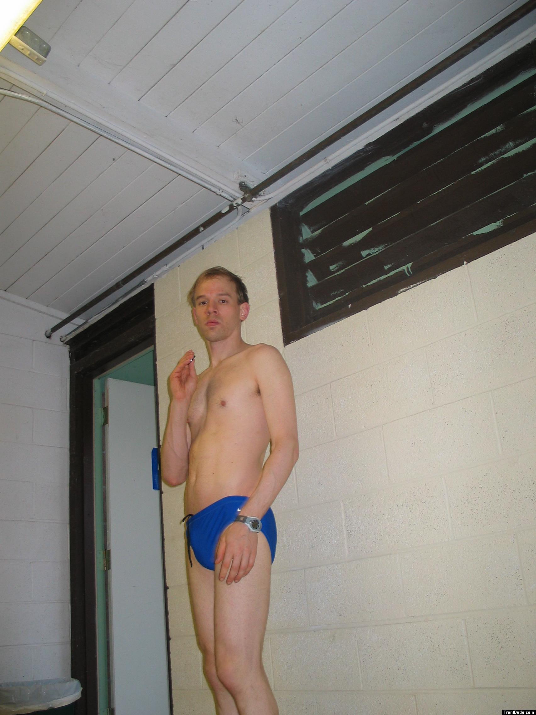 Wearing a blue Nike speedo brief