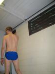 Wearing a blue Nike speedo brief