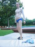 Wearing a blue Nike speedo brief