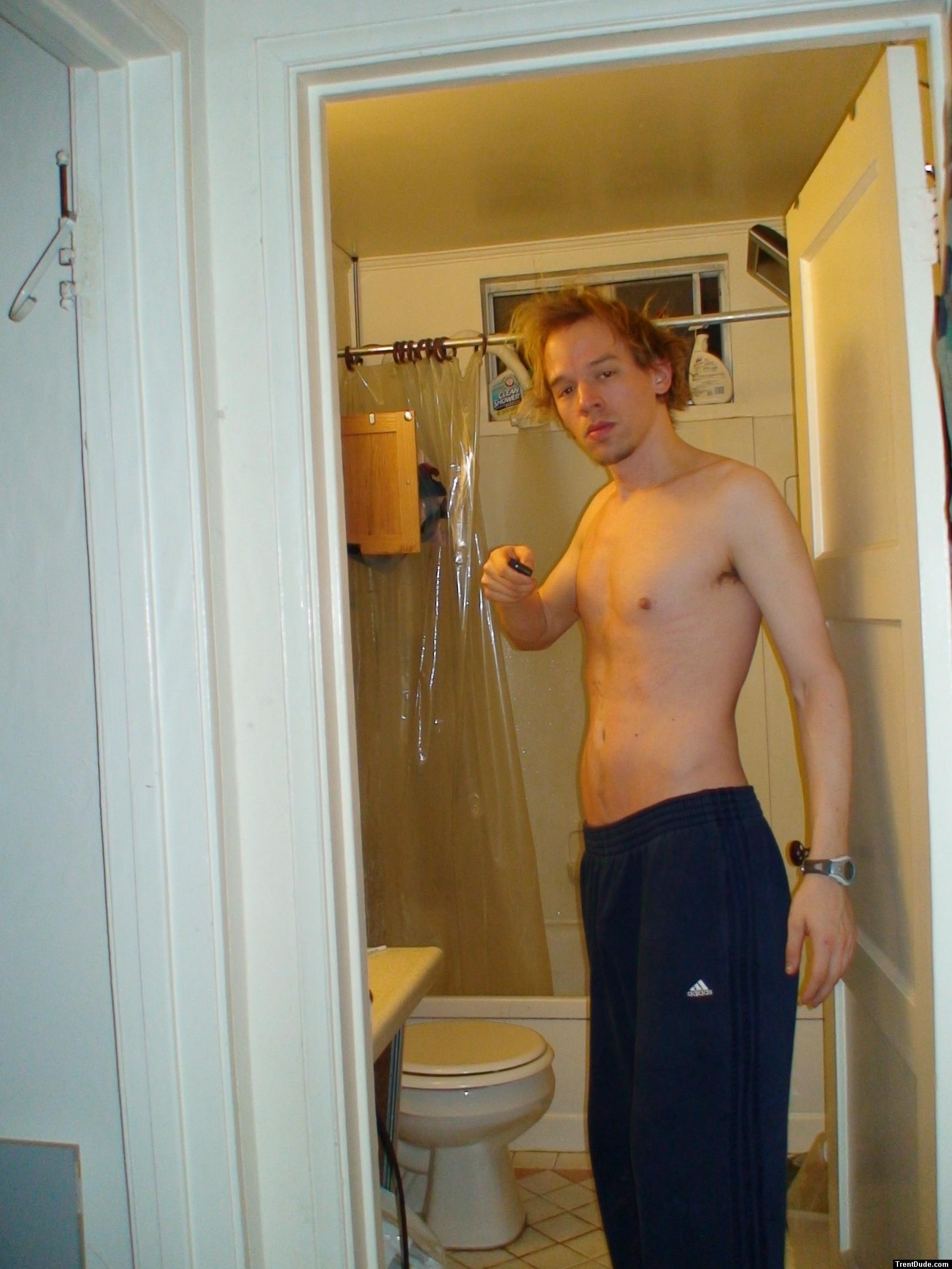 Shirtless in Addidas sweat pants