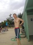 Addidas NY Yankes shorts over a read swim jammer