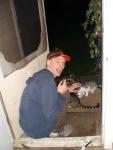 sitting with raccoons at the door!!