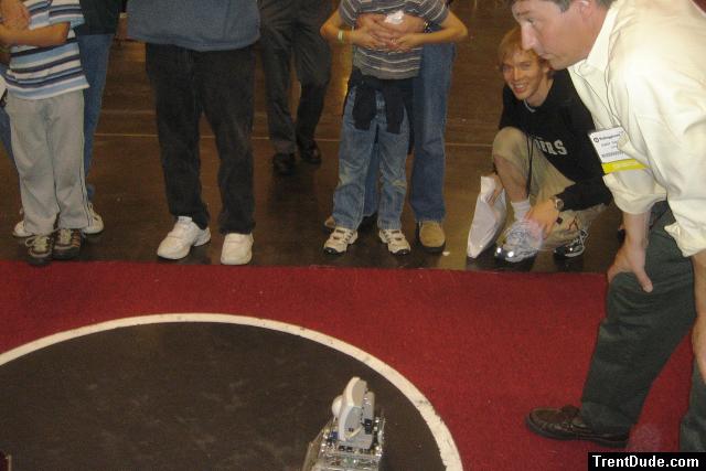 Trent watching a robot